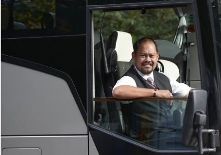 Driver in coach cabin window