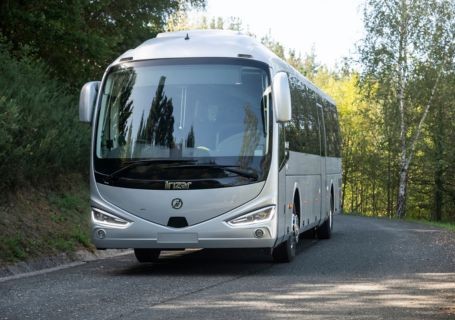 Grey coach parked on the road