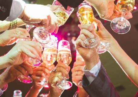 wedding guests with wine glasses